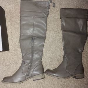Distressed flat knee boots